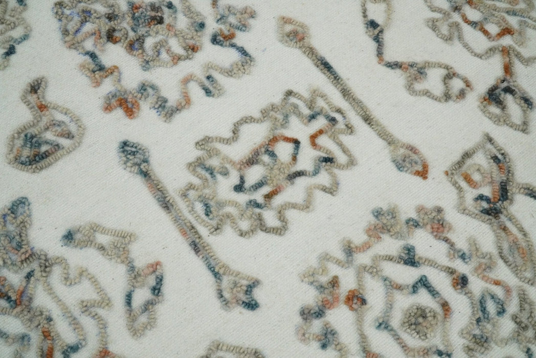 Modern Ivory And Blue Hand Tufted 5x8 Wool Textured Loop Area Rug