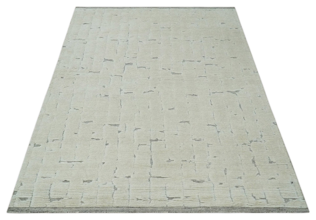 8x10 carved pattern Beige and Gray hand knotted wool rug