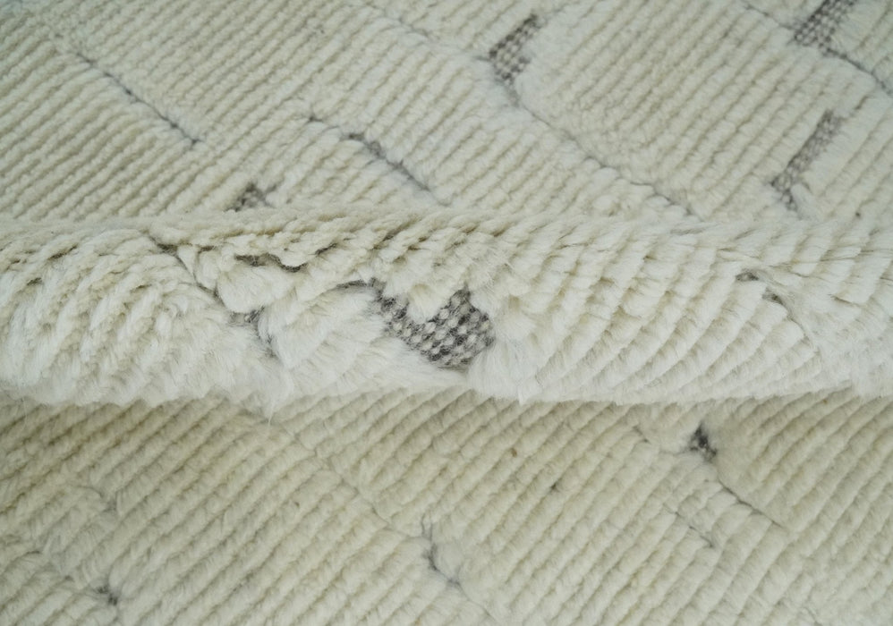 8x10 carved pattern Beige and Gray hand knotted wool rug