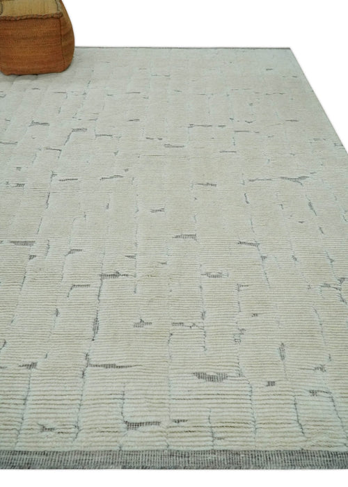 8x10 carved pattern Beige and Gray hand knotted wool rug