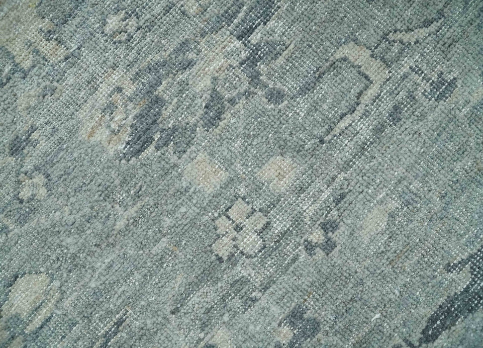 Distressed finished 8x10 Gray and Silver Low Pile wool Rug