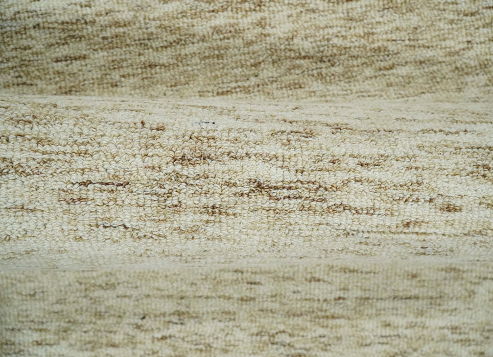 Beige and Ivory Modern Solid Hand Woven Wool Rug