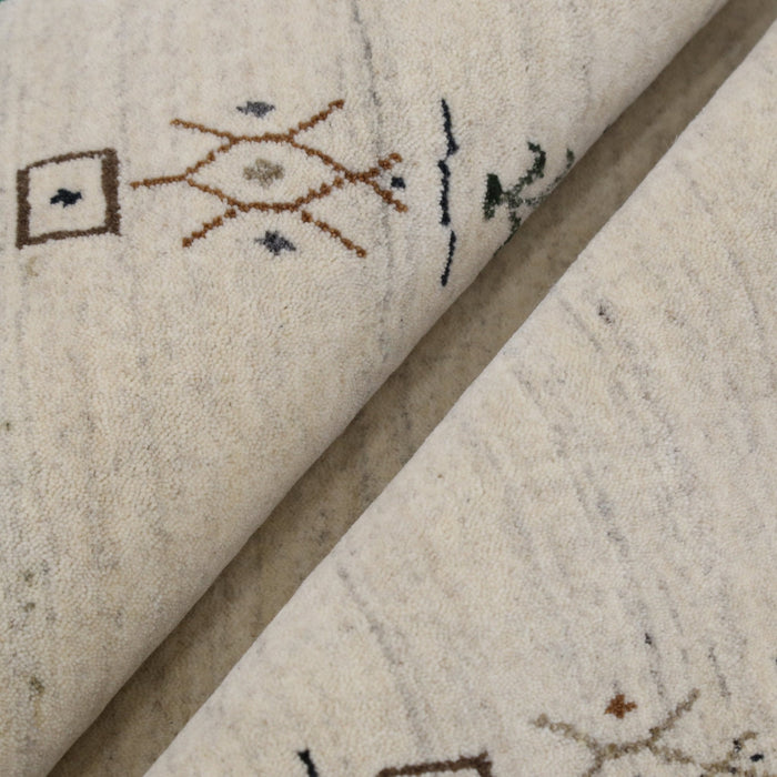 Beige Tribal Border Hand Loomed Wool Area Rug