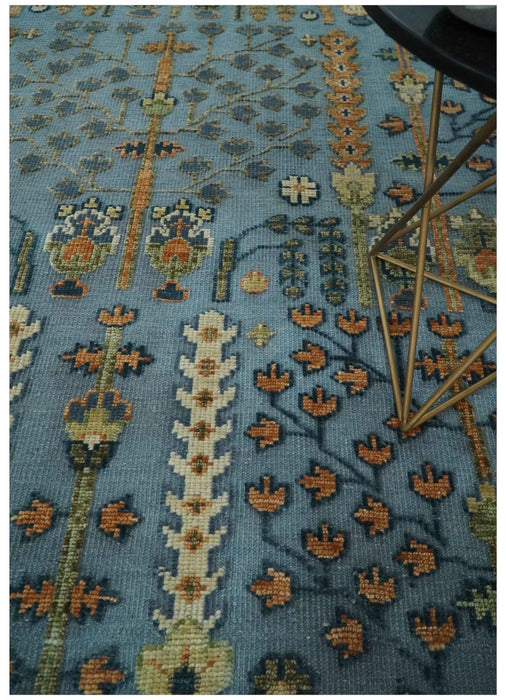 Custom Made Hand Knotted Blue and Rust Tree Design Low pile Wool Area Rug