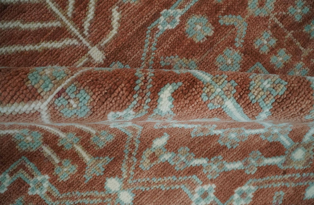 Hand knotted 8x10 Rust and Aqua Floral wool Area Rug
