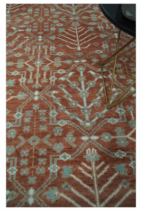 Hand knotted 8x10 Rust and Aqua Floral wool Area Rug