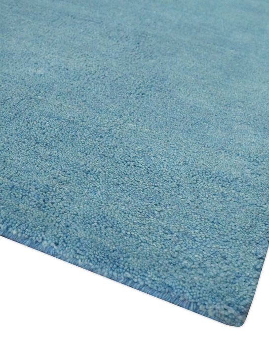 Hand Tufted Solid Plane Light Blue Woolen 8x10 wool Area Rug