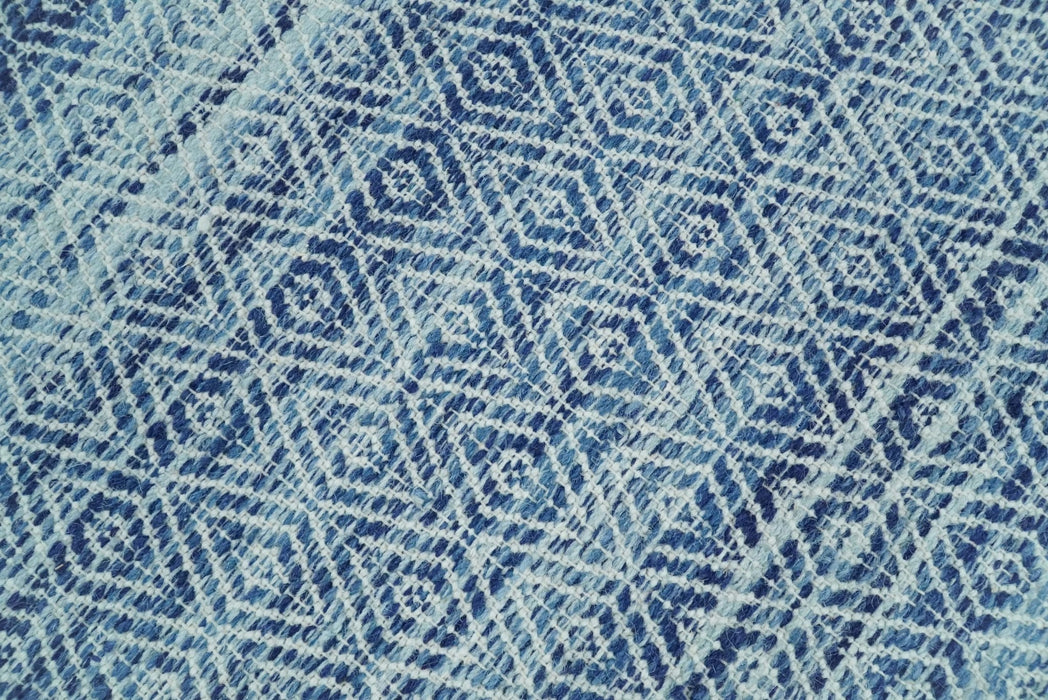 Handmade Boho Ivory and Blue Wool Blend Dhurrie Rug