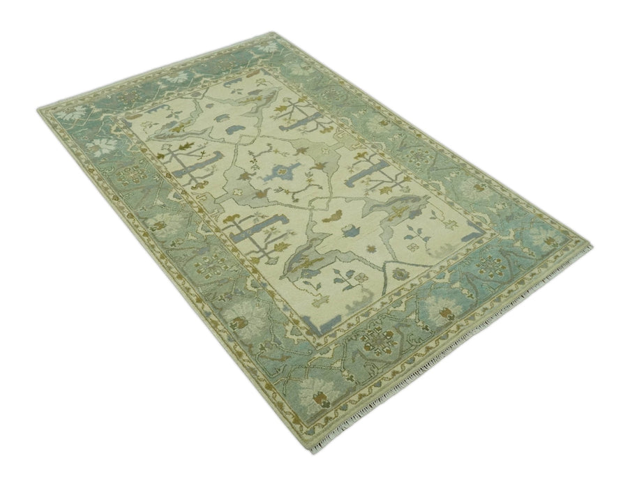 Ivory and Blue 6x9 Hand Knotted Traditional Oriental Oushak wool area rug