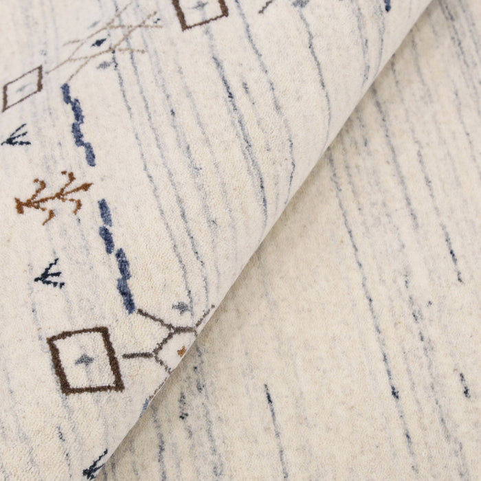 Ivory And Blue Tribal Border Design Hand Loomed Wool Area Rug