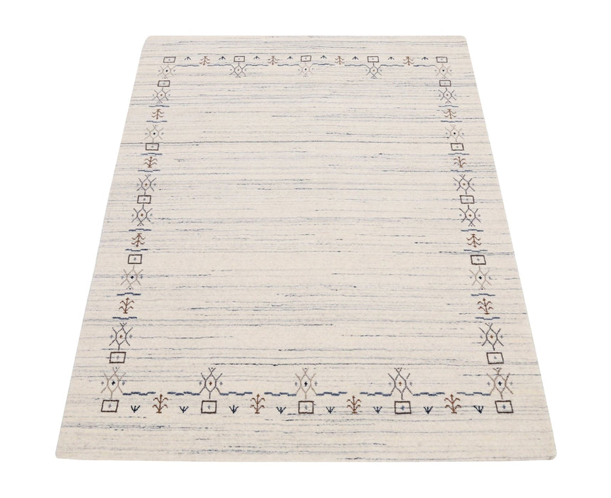 Ivory And Blue Tribal Border Design Hand Loomed Wool Area Rug