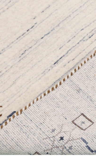 Ivory And Blue Tribal Border Design Hand Loomed Wool Area Rug