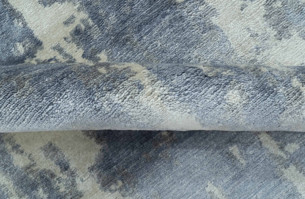 Modern Abstract Blue And Ivory Hand Knotted Wool Area Rug