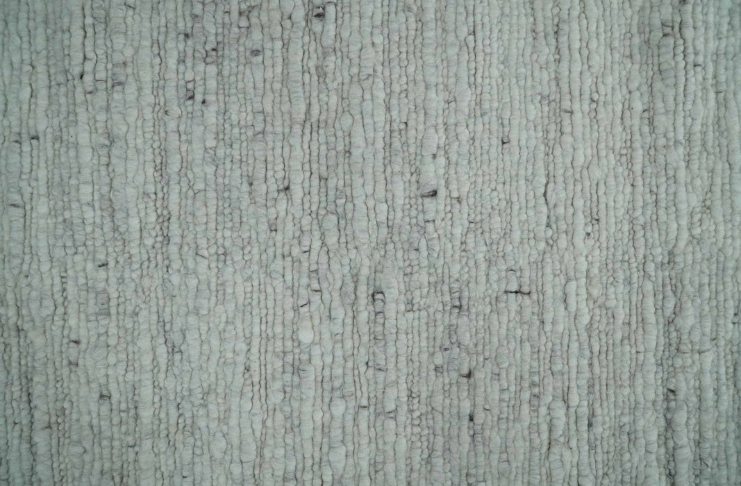Premium Contemporary loop Pile Ivory Hand woven wool Area Rug