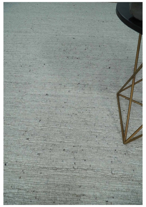 Premium Contemporary loop Pile Ivory Hand woven wool Area Rug