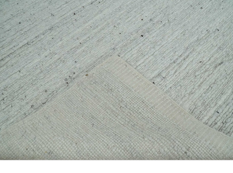 Premium Contemporary loop Pile Ivory Hand woven wool Area Rug