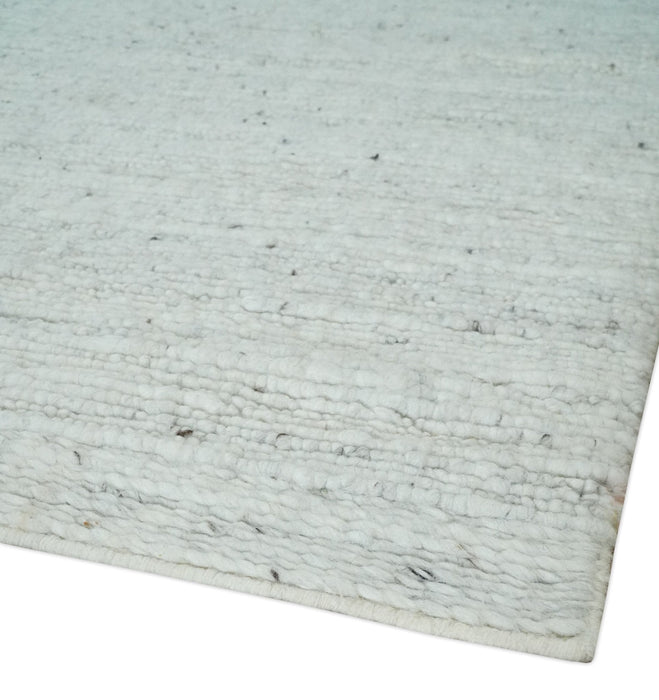 Premium Contemporary loop Pile Ivory Hand woven wool Area Rug