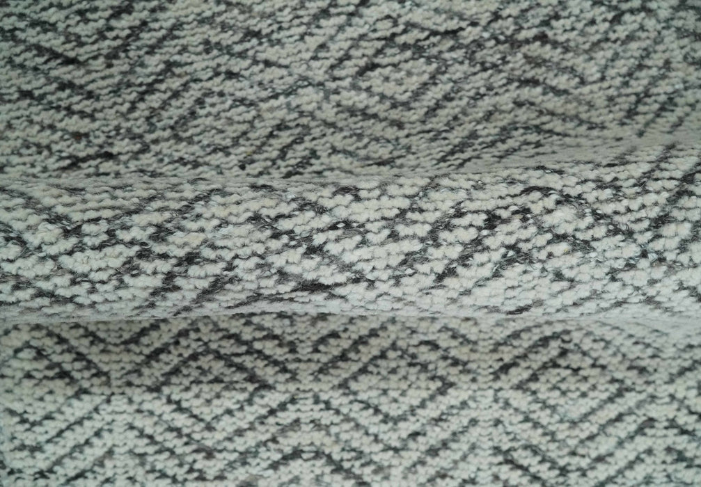 Small 2x3 Hand Knotted Ivory and Charcoal Tribal Design Wool Rug